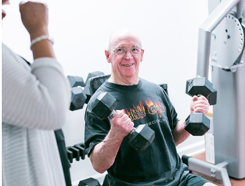 collington resident lifting weights