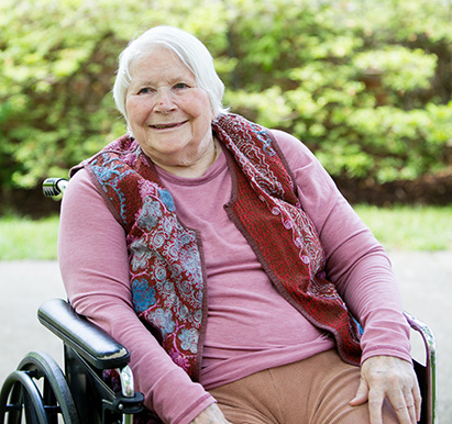 senior woman seated in wheelchair