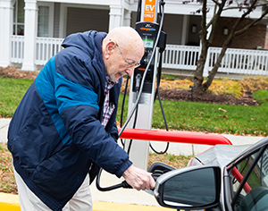 collington-resident-connecting-elecric-vehicle-to-charger