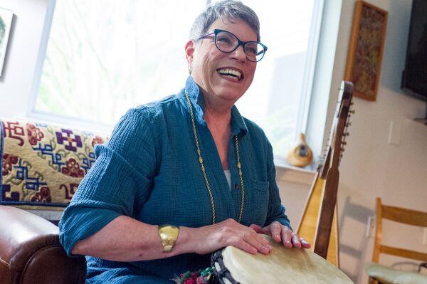 Resident playing bongos